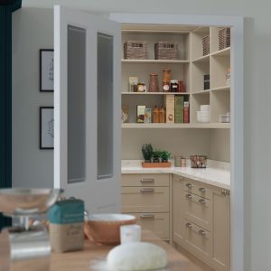 Alana Marine Blue and Stone shaker kitchen design by The Kitchen Depot. Walk in pantry with Stone shaker drawers