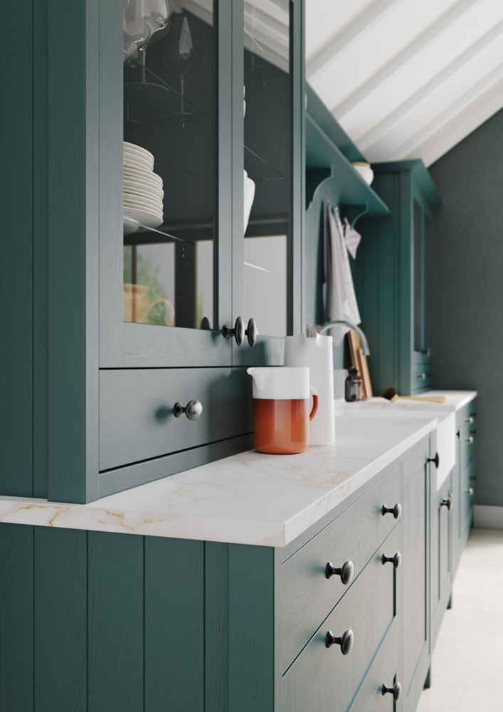 Alana Viridian Green shaker kitchen design by The Kitchen Depot. Cameo of green units with glass doors and green drawers