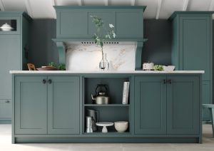 Alana Viridian Green shaker kitchen design by The Kitchen Depot. Kitchen island with open shelving in the middle
