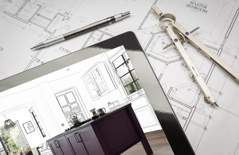 sketching a new kitchen design plan, using a compass sketch pad and tablet in a Kitchen Depot Showroom