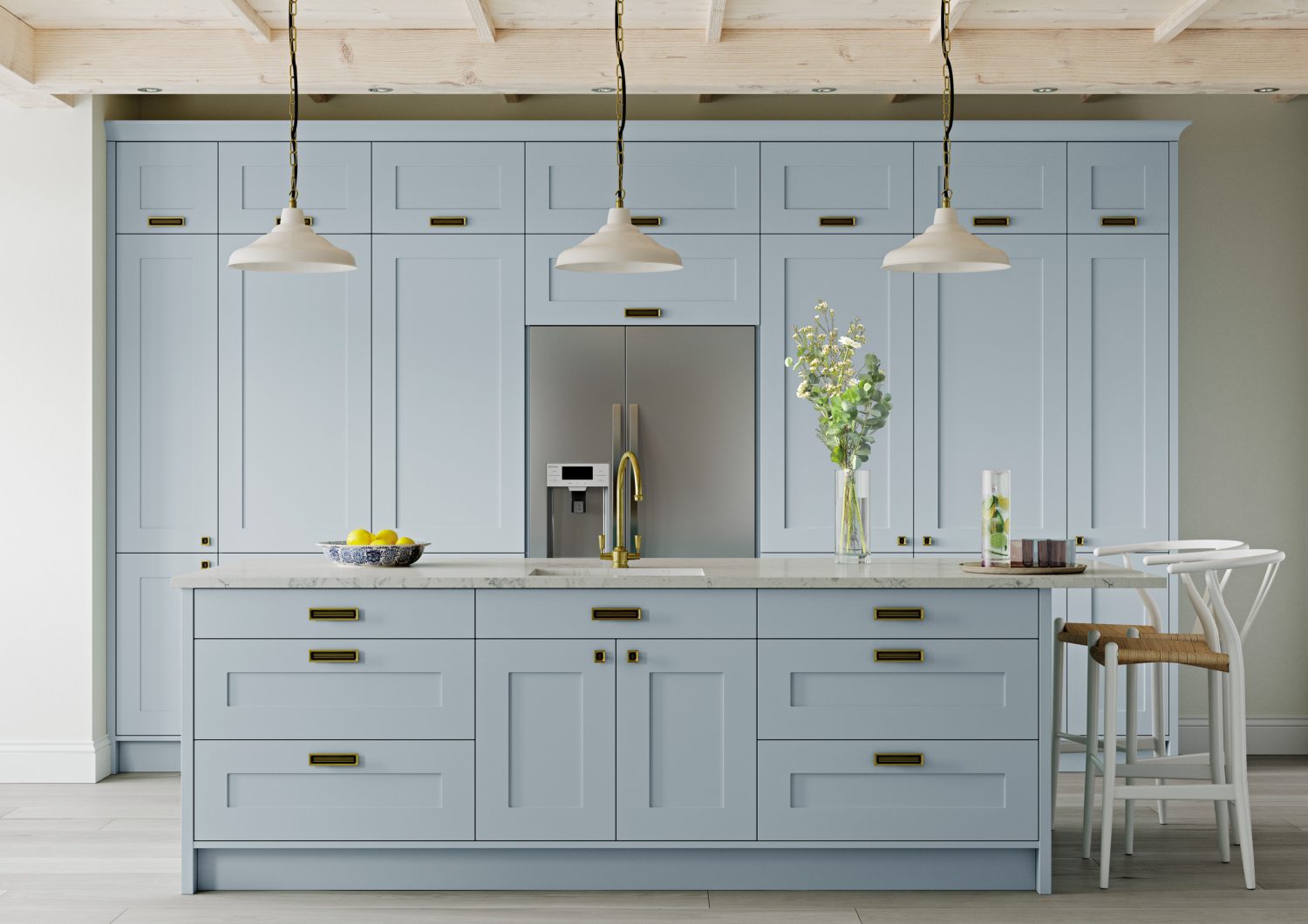 This Pantry Blue Shaker kitchen design is light and airy, the pastel Pantry Blue doors create a modern feel that is unique. The full kitchen has pantry blue doors, a kitchen island and a silver American fridge freezer. All doors have gold handles and was designed by The Kitchen Depot.