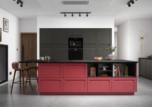 Hartford handleless kitchen door, showcased in a beautiful kitchen design using chicory red and graphite doors. Designed by The Kitchen Depot.