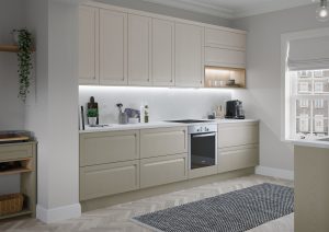 Hartford handleless kitchen door, showcased in a beautiful kitchen design using shell and stone paint to order colour options. Designed by The Kitchen Depot also includes top units, base units and an over in this kitchen
