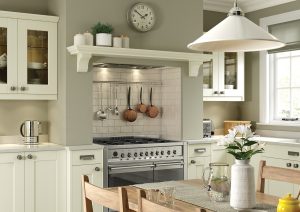 Kendal Ivory shaker kitchen with oven and table, made by The Kitchen Depot