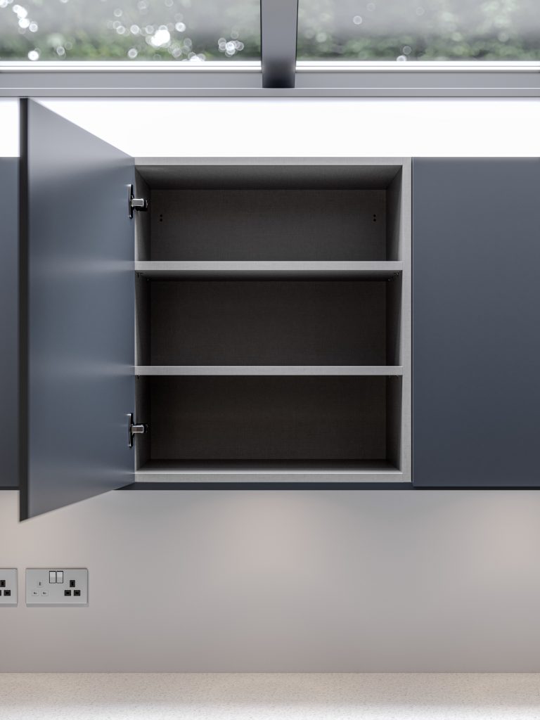 The Kitchen Depot's Linea wall unit kitchen cabinet, showing the kitchen door opened and the inside of the cabinet with two shelves. The kitchen door is graphite grey and the inside is a lighter textured grey.