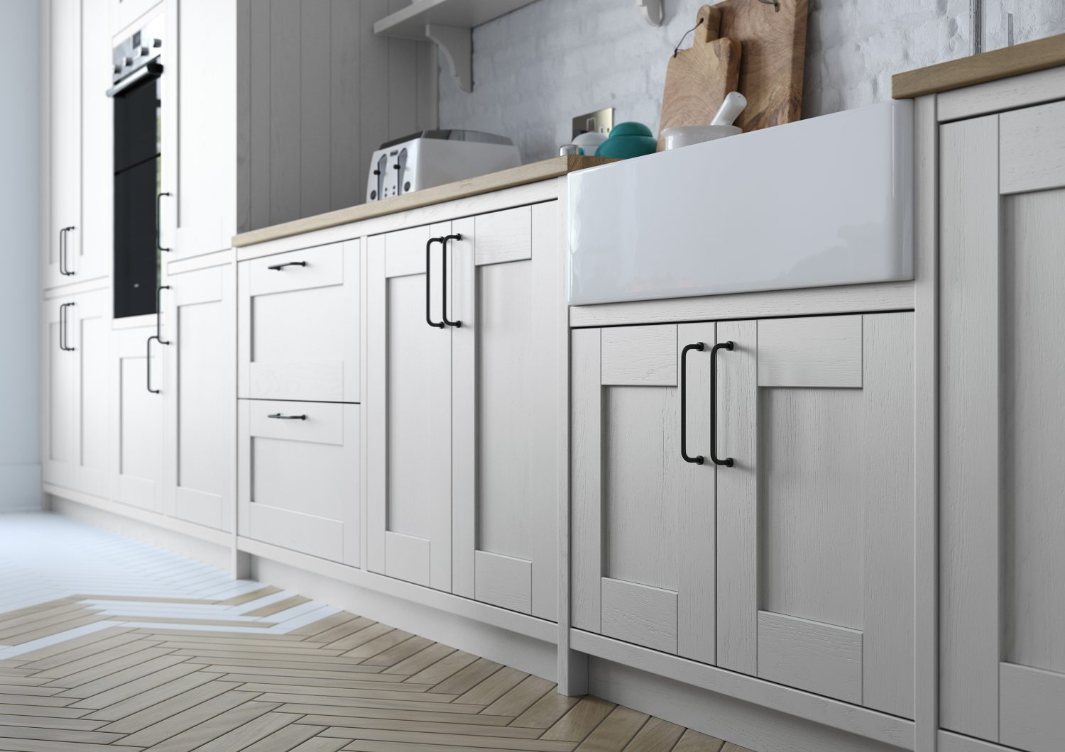 Run of Madison shaker kitchen cabinets in Light Grey, made by The Kitchen Depot