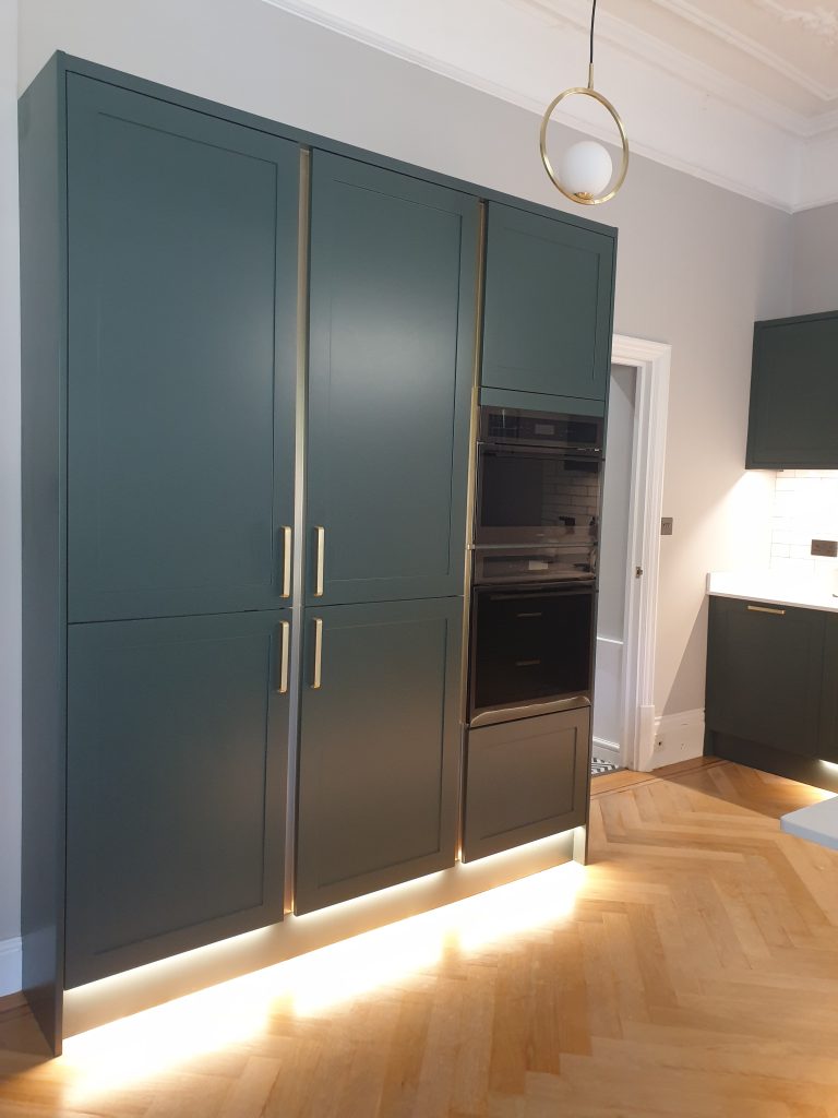 Tall Clara Heritage Green Kitchen larders, made by The Kitchen Depot