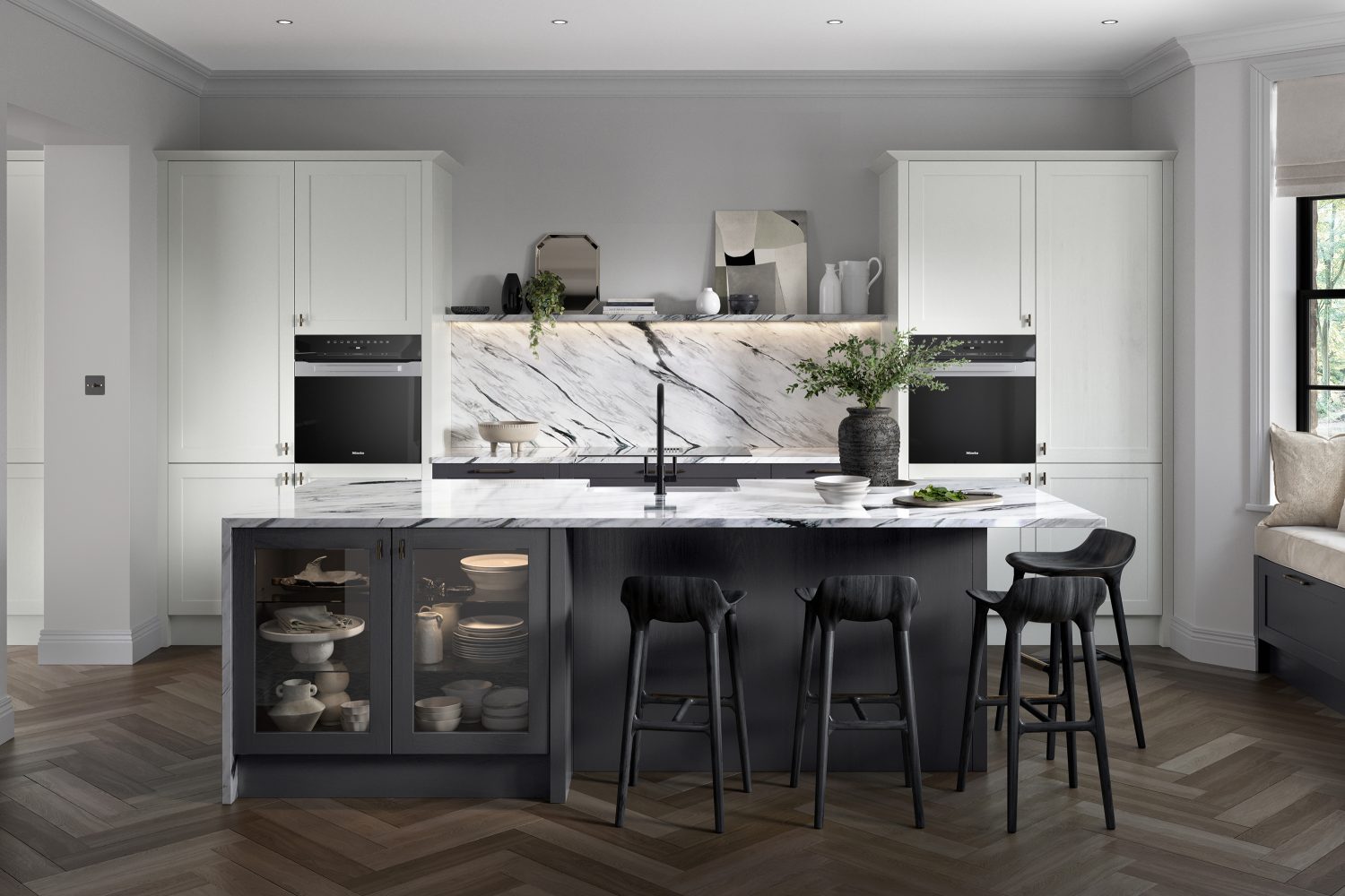 Alana Graphite & Light Grey shaker kitchen made by The Kitchen Depot featuring light worktops and stools around island