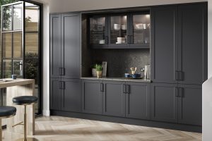 Darwin Graphite Grey shaker kitchen made by The Kitchen Depot featuring tall cabinets and worktop