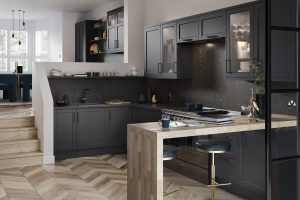 Darwin Graphite Grey shaker kitchen made by The Kitchen Depot, side angle showcasing wooden breakfast bar