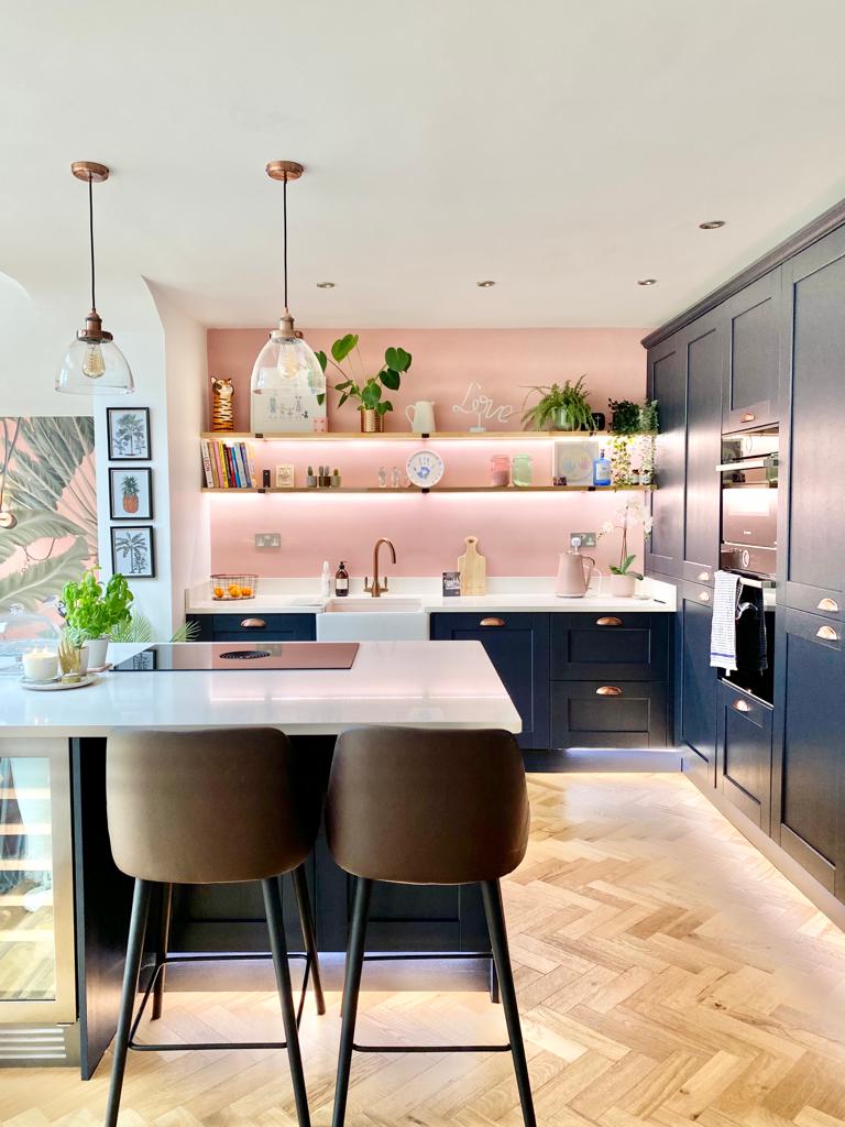 Kendal Indigo shaker kitchen with pink walls stools and plants