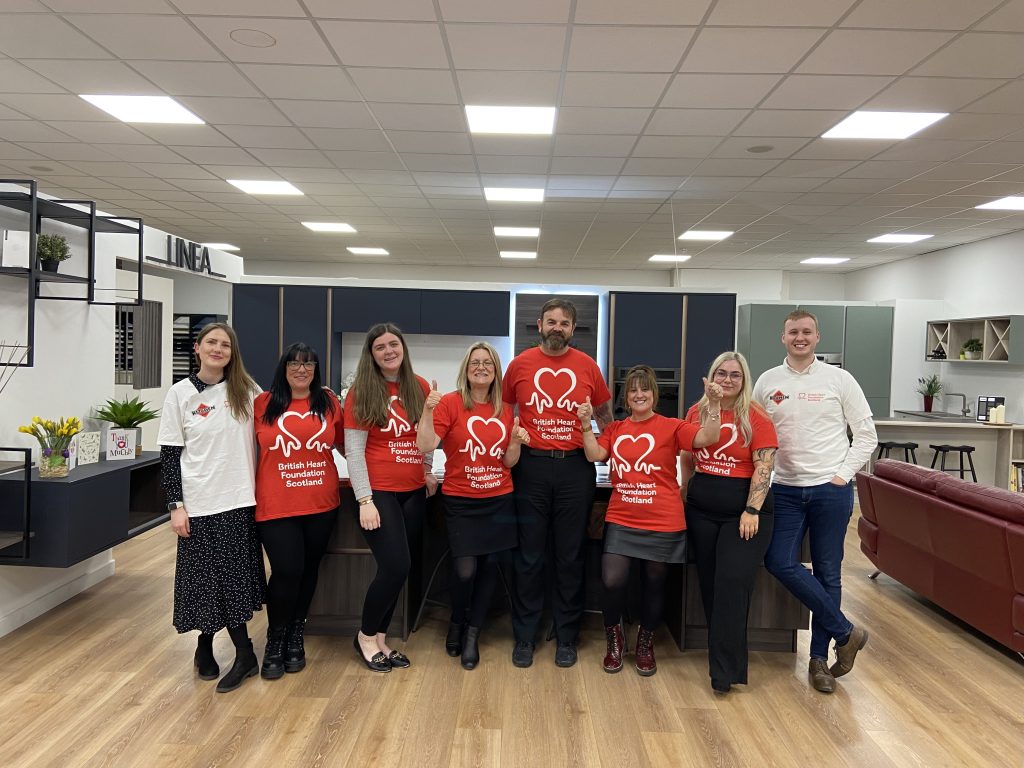 The Kitchen Depot Kiltwalk 2023 team with their British Heart Foundation T shirts on in our Glasgow Hillington showroom