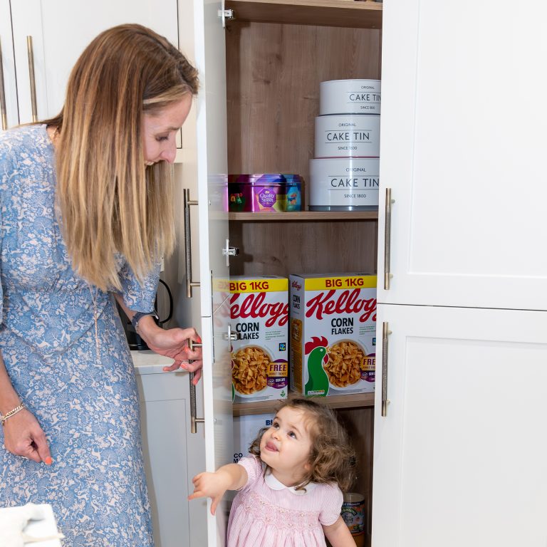 Kirsten and her daughter playing with a kitchen larder The Kitchen Depot East Kilbride