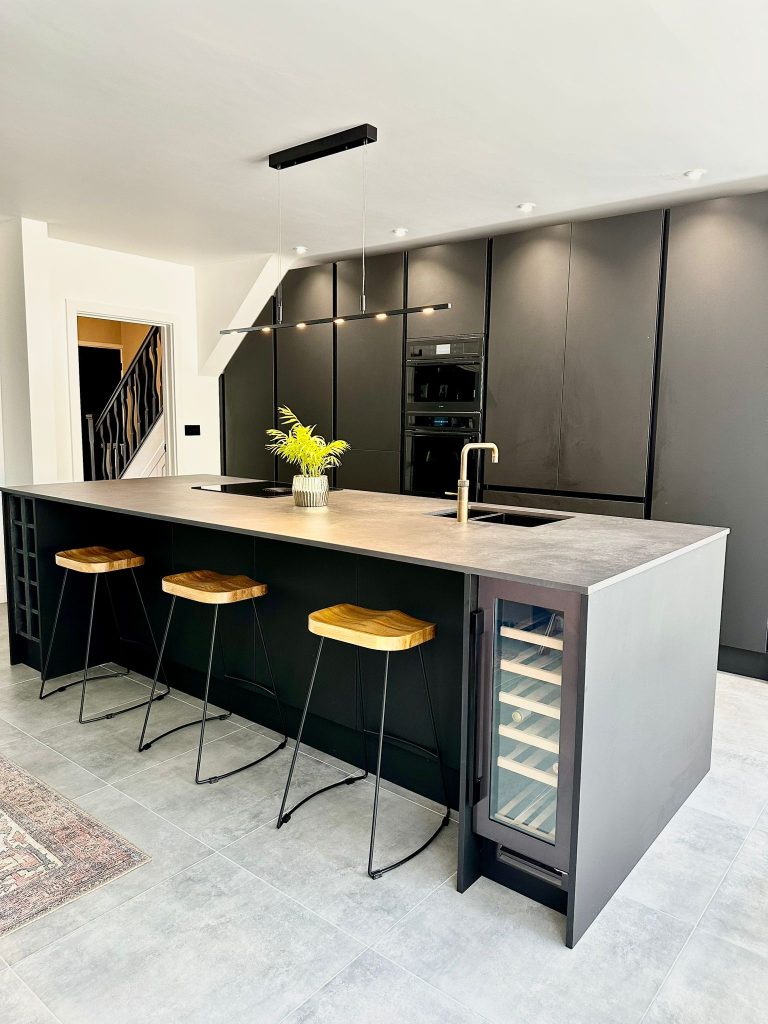 The Setterfield's Matte Black Linea Kitchen with Caple wine fridge