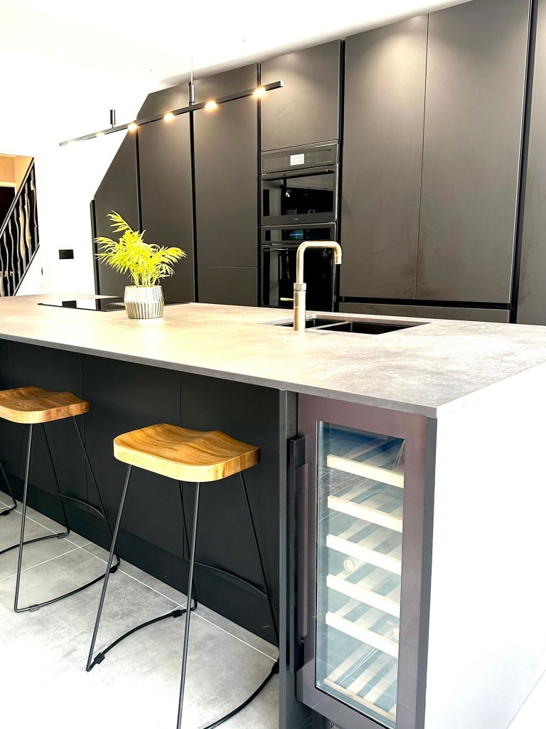 The Setterfield's Matte Black Linea Kitchen close up of island