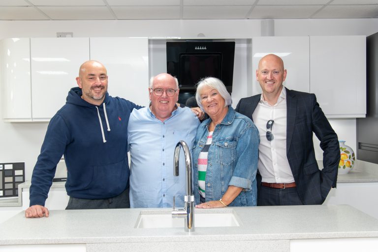 Peter, JIm, Grace and Mark McCay attending the reopening of The Kitchen Depot