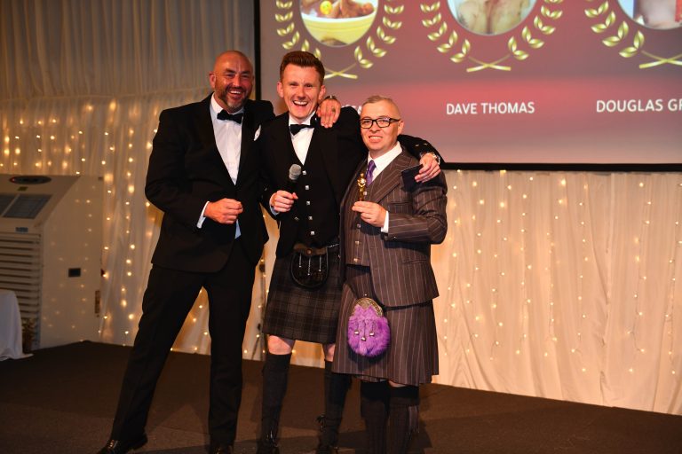 Peter McCay, Graeme Ashton, Douglas Graham posing with the Best Picture Award at The Kitchen Depots 20th Anniversary Celebration