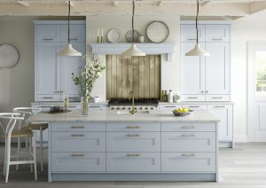 Georgina Pantry Shaker Kitchen Design by The Kitchen Depot with island and wood effect backlash behind hob