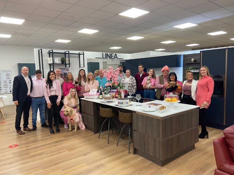 The Kitchen Depot Hillington team wearing pink shirts at the charity day in Glasgow showroom in aid of Breast Cancer Awareness Day