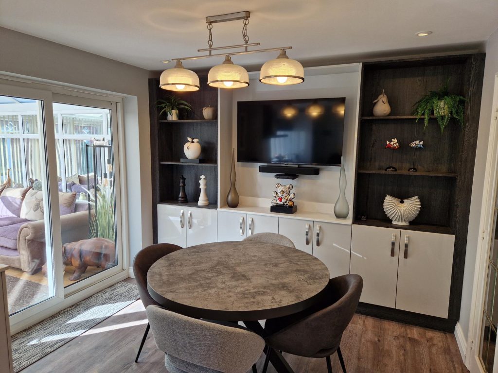 The Evans family new media station with Black Glazed Halifax Oak shelving and Zara Gloss Light Grey doors by The Kitchen Depot