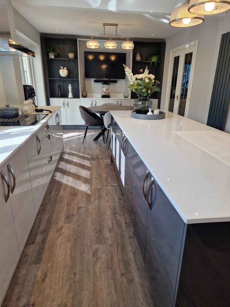 The Evans family new Zara Gloss Light Grey and Graphite modern kitchen design by The Kitchen Depot Island and wall units