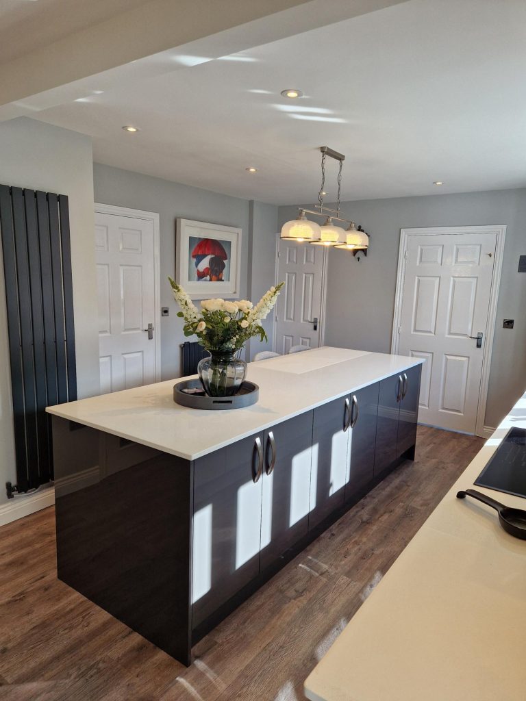 The Evans family new Zara Gloss Light Grey and Graphite modern kitchen design by The Kitchen Depot kitchen island