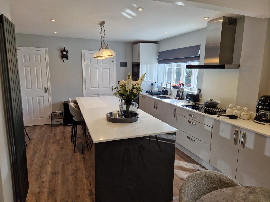 The Evans family new Zara Gloss Light Grey and Graphite modern kitchen design by The Kitchen Depot kitchen island